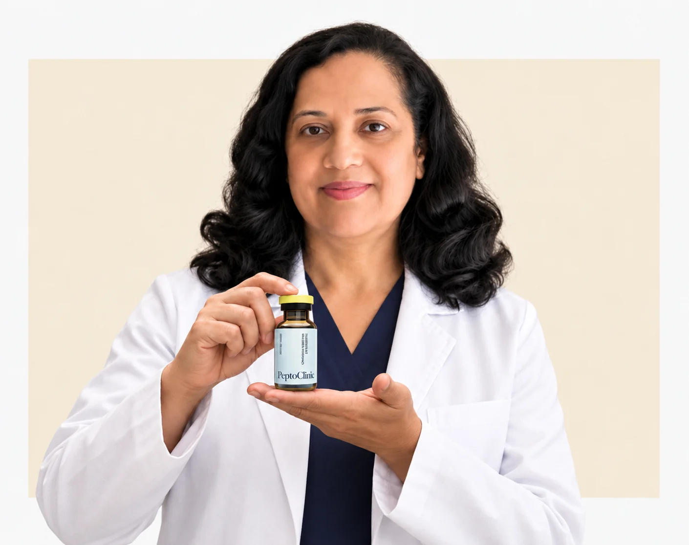 Nayana Ambardekar, MD, in a white coat, holding a PeptoClinic vial